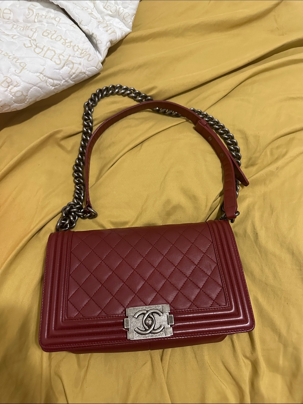 CHANEL Quilted Red Leather Shoulder Bag with Silver Chain